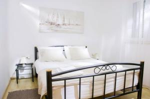 Cama o camas de una habitación en Apartments IDa II