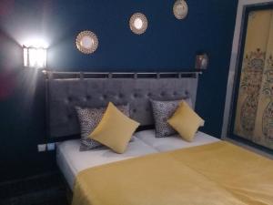 Postel nebo postele na pokoji v ubytování Hotel Batha