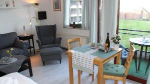 Χώρος καθιστικού στο PEMATRA Ferienwohnungen Ostseestrasse 2