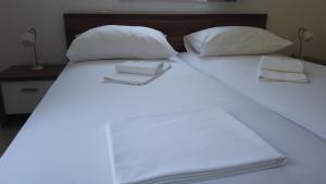 Кровать или кровати в номере Guest House Kukuljica 2