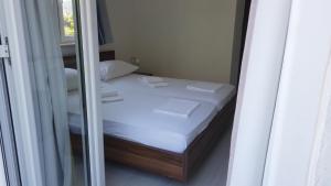 Кровать или кровати в номере Guest House Kukuljica 2