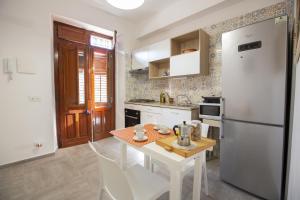 A kitchen or kitchenette at Nonna Maria Holiday