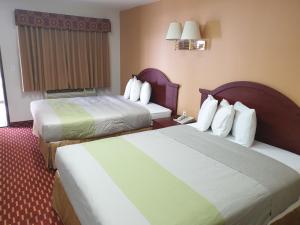 Voodi või voodid majutusasutuse Split Mountain Motel toas