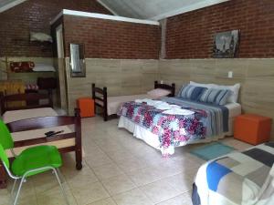 Cama ou camas em um quarto em Pousada & Pesca Esportiva Fazolin