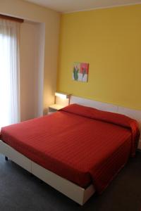 Postel nebo postele na pokoji v ubytování Hotel Miramonti