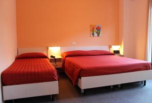 Säng eller sängar i ett rum på Hotel Miramonti
