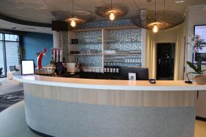 Lounge nebo bar v ubytování ibis Budget Le Treport Mers Les Bains