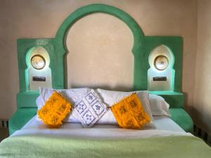 Postel nebo postele na pokoji v ubytování Maison Hassan Merzouga