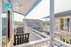 Balkón nebo terasa v ubytování Sea Shell Beach Cottages & Suites