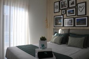 Artvilla Tourism Houses tesisinde bir odada yatak veya yataklar