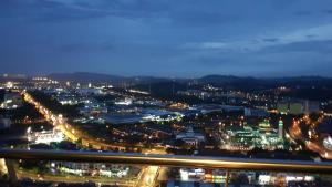 a view of a city at night at MHB 30 SUlTE EVO SOHO BANDAR BARU BANGI FREE NETFLIX AND WIFI in Bangi
