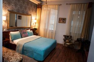 Krevet ili kreveti u jedinici u okviru objekta Art-Rustic Boutique Hotel