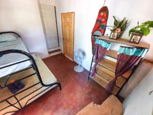 Bunk bed o mga bunk bed sa kuwarto sa Casa Ital-Tico, Playa Negra