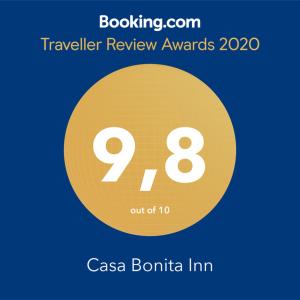 Casa Bonita Inn في لا بارغيرا: دائرة صفراء عليها رقم