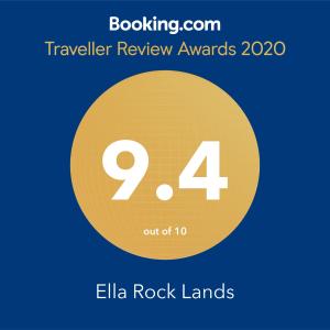 um sinal que lê prémios de revisão de viagens com o número quatro em Ella Rock Lands em Ella