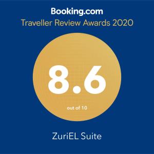 żółty okrąg z numerem 8 i nagrody za ocenę podróży tekstu w obiekcie ZuriEL Suite GUEST HOUSE w mieście Coimbatore