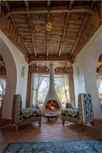 Ein Sitzbereich in der Unterkunft Dar Echchaouen Maison d'Hôtes & Riad