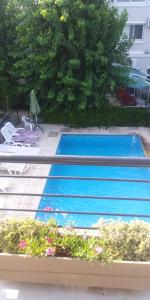 Вид на бассейн в Pilar Apart Hotel или окрестностях