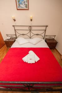 Postel nebo postele na pokoji v ubytování Cecil Hotel