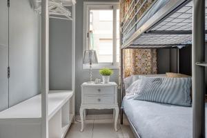 A bed or beds in a room at Vistas al Mar. Gran Terraza