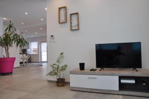 Μια τηλεόραση ή/και κέντρο ψυχαγωγίας στο Villa Vauban