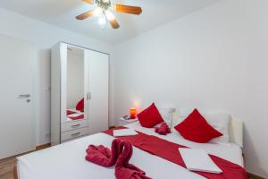 Postel nebo postele na pokoji v ubytování Apartments Palma