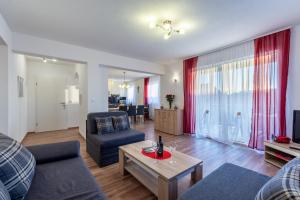 Posezení v ubytování Apartments Palma + 37 fotografií