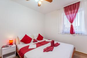 Postel nebo postele na pokoji v ubytování Apartments Palma