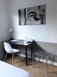 Posezení v ubytování Logis Hôtel l'Abricotine