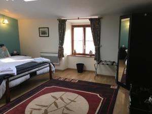 Postel nebo postele na pokoji v ubytování La Maison d'Olives
