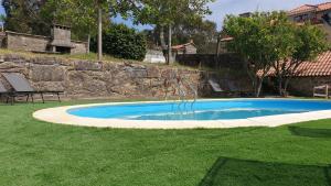 Bazén v ubytování Hotel Rústico Punta Uia nebo v jeho okolí