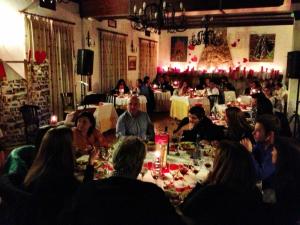a group of people sitting around a table in a restaurant at Casas Rurales VegaSierra in Bogarra +62 photos