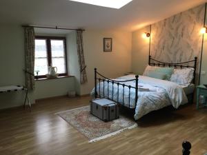 Postel nebo postele na pokoji v ubytování La Maison d'Olives