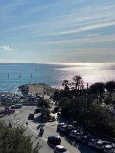 a view of a parking lot next to the ocean at casa al mare in Varazze