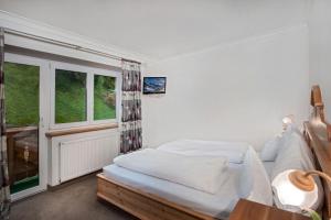 A bed or beds in a room at Appartement Sport Steger