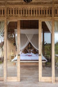 Balkón nebo terasa v ubytování Kidem Ubud Villas