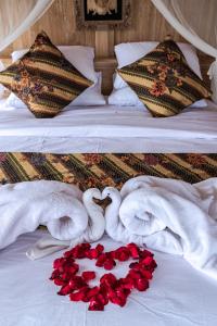 Postel nebo postele na pokoji v ubytování Kidem Ubud Villas