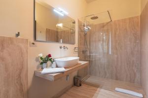 Koupelna v ubytování Wine Estate Rooms Paradiso di Cacuci