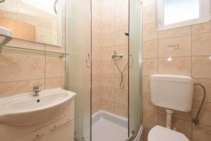 Koupelna v ubytování Apartmani Jasna