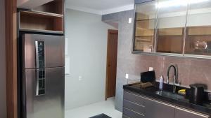 مطبخ أو مطبخ صغير في Apartamento Confortável Beira-Mar