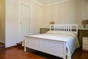 Postel nebo postele na pokoji v ubytování Gialel Pisa Guest House