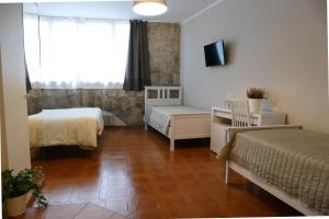 Postel nebo postele na pokoji v ubytování Gialel Pisa Guest House