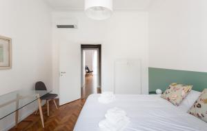 Кровать или кровати в номере Giuditta's Place - Milan in the Heart