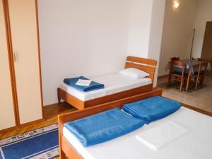 Postel nebo postele na pokoji v ubytování Apartments Šarić