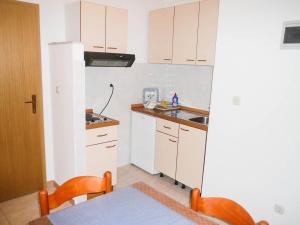 Kuchyň nebo kuchyňský kout v ubytování Apartments Šarić