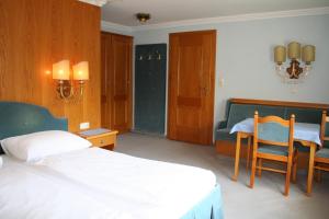 Postel nebo postele na pokoji v ubytování Gasthaus Überfuhr