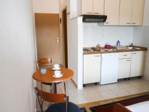 Kuchyň nebo kuchyňský kout v ubytování Apartments Šarić