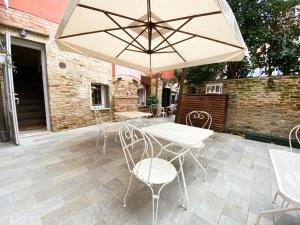 Patio nebo venkovní prostory v ubytování Rigoletto Charm