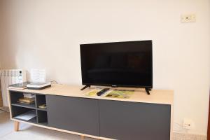 TV a/nebo společenská místnost v ubytování Apartamento Pórtico Paraíso