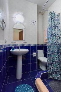 A bathroom at Estera Hotel